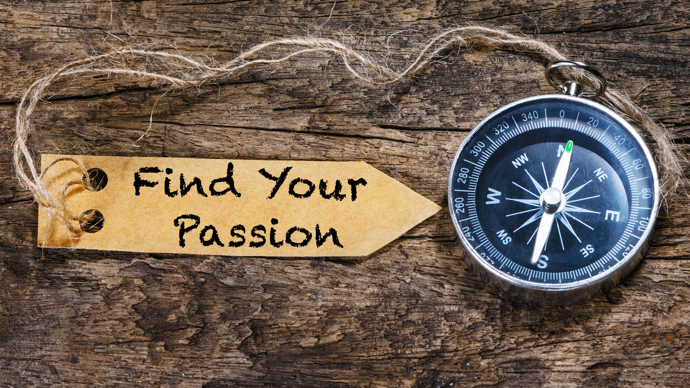 Find your passion - motivation phrase handwriting on label with compass