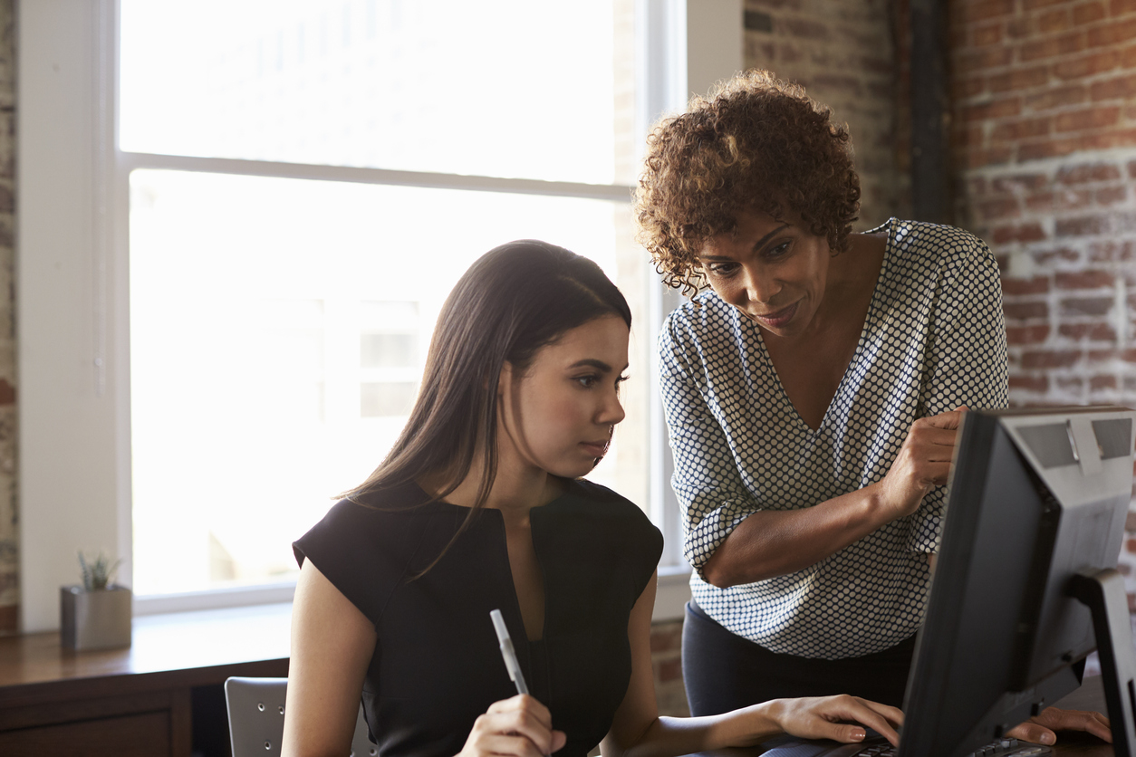 Built By She - Two Businesswomen Working On Computer In Office