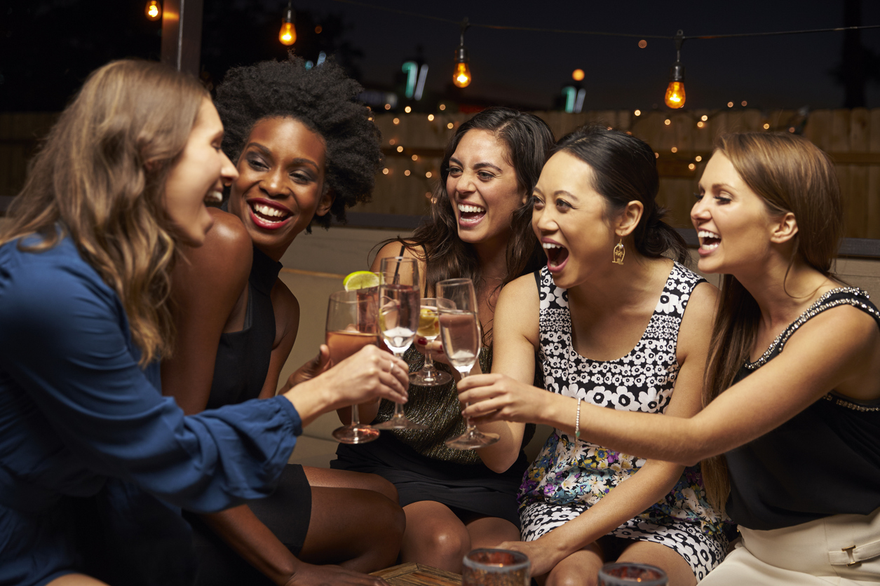 Built By She - Community Group Of Female Friends Enjoying Night Out At Rooftop Bar